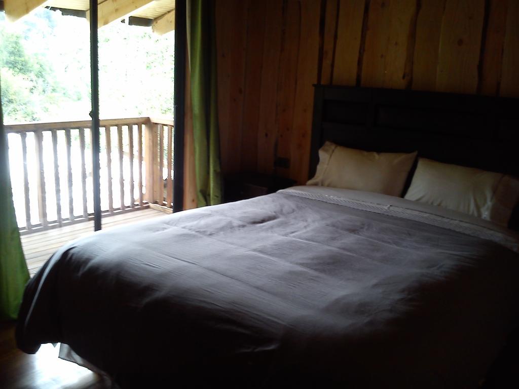 Hostal Los Alamos Neltume Quarto foto
